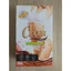 Envase de 300 g de polvo sabor chocolate Cocoa Slim, con cuchara dosadora y bebida estilo chocolate en vaso.
