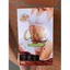 Envase de 300 g de polvo de cacao Cocoa Slim, con una cuchara y una bebida estilo cacao preparada.